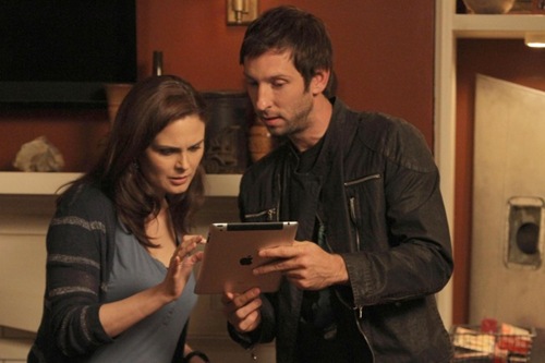BONES:   Jeffersonian intern Colin Fisher (guest star Joel David Moore, R) brings Brennan (Emily Deschanel, L) important evidence in "The Method in the Madness" episode of BONES airing Monday, Nov. 5 (8:00-9:00 PM ET/PT) on FOX.  ©2012 Fox Broadcasting Co.  Cr:  Patrick McElhenney/FOX