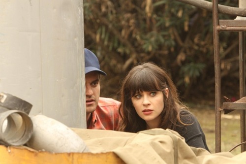 NEW GIRL:  Jess (Zooey Deschanel, R) and Nick (Jake Johnson, L) snoop outside the house of one of her students in the "Pepperwood" episode of NEW GIRL airing Tuesday, Jan. 22 (9:00-9:30 PM ET/PT) on FOX.  ©2012 Fox Broadcasting Co.  Cr: Patrick McElhenney/FOX