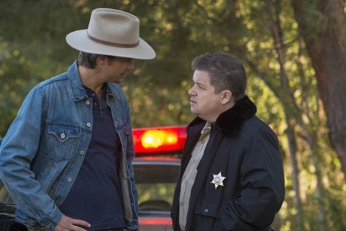 JUSTIFIED -- Hole in the Wall -- Episode 401 (Airs Tuesday, January 8, 10:00 pm e/p) -- Pictured: (L-R) Timothy Olyphant as Raylan Givens, Patton Oswalt as Bob Sweeney -- CR: Prashant Gupta/FX