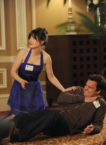 NEW GIRL:  Jess (Zooey Deschanel, L) helps Nick (Jake Johnson, R) after Sam punches him in the "Marriage" episode of NEW GIRL airing Tuesday, Feb. 5 (9:00-9:30 PM ET/PT) on FOX.  ©2013 Fox Broadcasting Co.  Cr: Ray Mickshaw/FOX