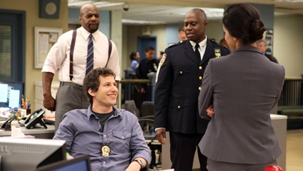 BROOKLYN NINE-NINE:  Jake (Andy Samberg, second from L) mocks the new Captain (Andre Braugher, C) in the new comedy BROOKLYN NINE-NINE premiering this fall on FOX. Also pictured L-R: Terry Crews and Melissa Fumero. ©2013 Fox Broadcasting Co. Cr: Eddy Chen/FOX