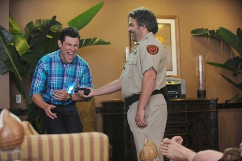 NEW GIRL:  When Schmidt (Max Greenfield, L) tries to help Nick, he gets tazered by the hotel security guard (guest star Hemky Madera, R) in the &quot;All In&quot; season premiere episode of NEW GIRL airing Tuesday, Sept. 17 (9:00-9:30 PM ET/PT) on FOX. &#xa9;2013 Fox Broadcasting Co. Cr: Ray Mickshaw/FOX
