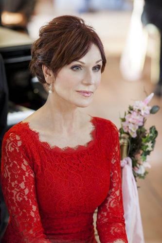 In a rush to get married before moving across the country, June Fraser and Alex Blackwell hastily plan a winter wedding under the disapproving eye of Alex's scheming mother, Diana.  (Photo: Marilu Henner)  Photo Credit: Copyright 2013 Crown Media, Inc./Photographer: Eike Schroter 