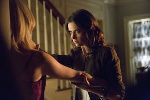 The Vampire Diaries -- "No Exit" -- Image Number: VD514b_0394.jpg -- Pictured (L-R): Candice Accola as Caroline (back to camera) and Olga Fonda as Nadia -- Photo: Bob Mahoney/The CW -- &copy; 2014 The CW Network, LLC. All rights reserved