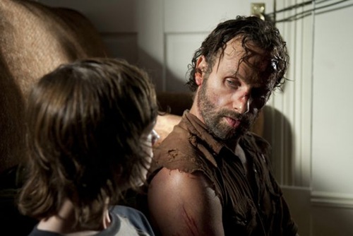 Carl Grimes (Chandler Riggs) and Rick Grimes (Andrew Lincoln) - The Walking Dead _ Season 4, Episode 9 - Photo Credit: Gene Page/AMC